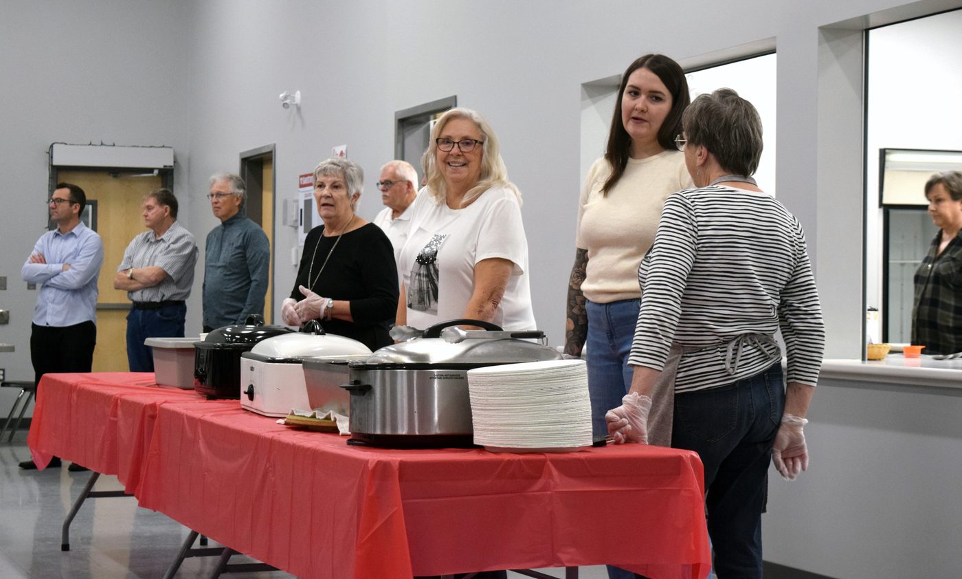 Deloraine 2000 Club volunteers serving at the Seniors Supper